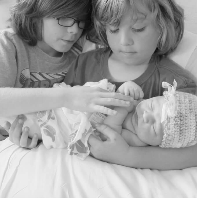Newborn Picture with Siblings