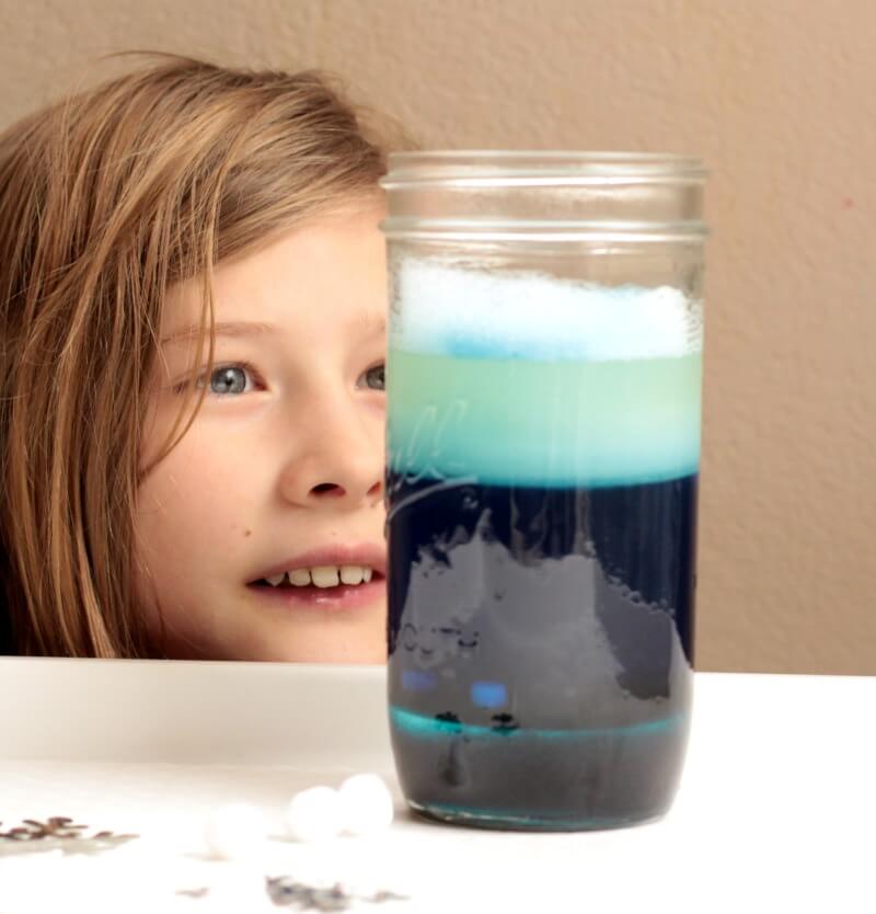 Looking for a simple winter science project? Learn about density and buoyancy with this simple winter density jar made from kitchen ingredients!