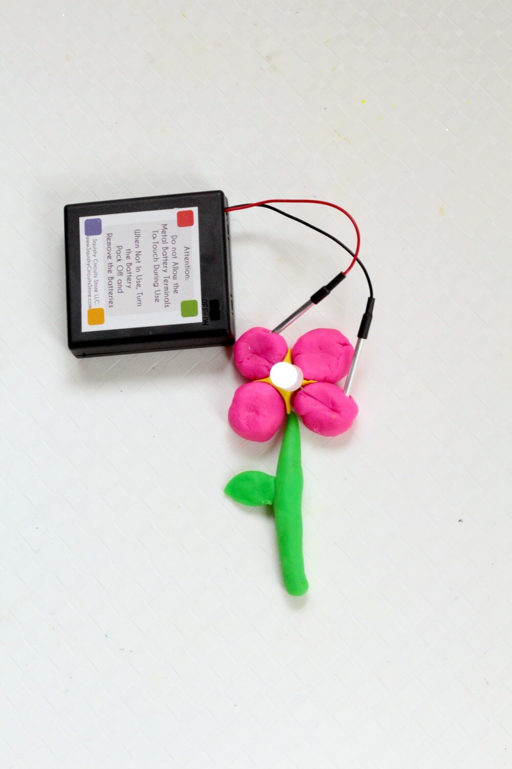 Make your very own light-up flower with a Squishy Circuits kit! Kids will love making a flower that really lights up in this STEM project!